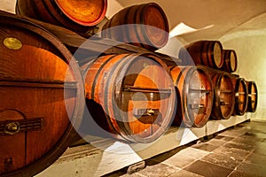 Pile of wine barrels in a wine cellar