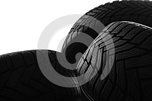 Pile of winter tires on white background, closeup