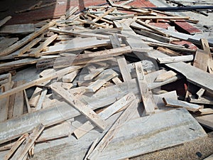 Pile of wood debris at a shop building demolition site, Construction waste on the restaurant floor