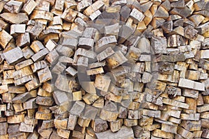 Pile of wood logs. Wood logs texture. Wooden background. Pile of wood close-up.