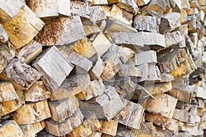 Pile of wood logs. Wood logs texture. Wooden background. Pile of wood close-up.