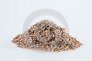 Pile of wood smoking chips isolated on white.