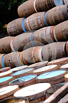 A pile of wooden barrels