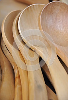 A pile of wooden spoon photo