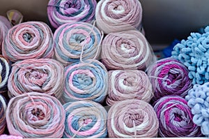 Pile of wool rolls  in haberdashery