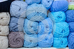 Pile of wool rolls  in haberdashery