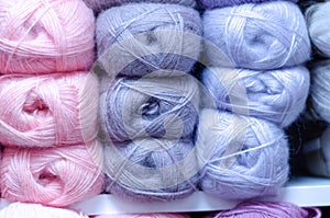 Pile of wool rolls  in haberdashery