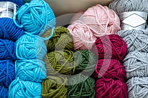 Pile of wool rolls  in haberdashery