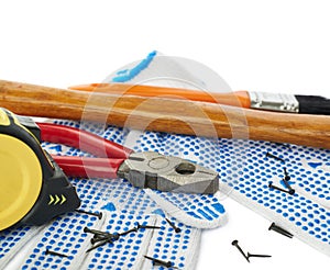 Pile of working tools over isolated white background