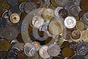 Cenital view of a pile of world coins