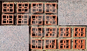 Pile of worm block bricks prepared for pavement pattern texture background