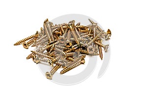 pile of yellow zinc plated screws on white background, full depth of field