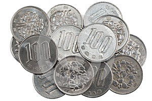 Pile of 100 yen coins japanese money.