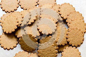 Pile of yummy Ginger cookies, traditional Christmas treat. Gingerbread food background