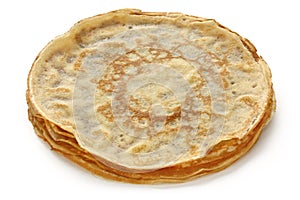 Piled crepes on a white background photo