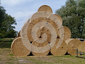 Piled straw bales photo