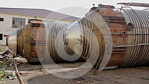 Piled up scrap metal, old profiles and equipment, parts of old industrial system, complex after cassation for recycling metal.