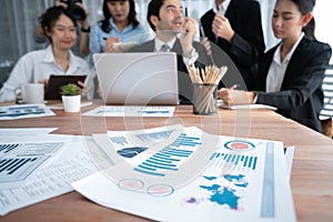 Piles of analyzed financial data dashboard on wooden table. Habiliment