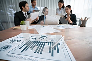 Piles of analyzed financial data dashboard on wooden table. Habiliment