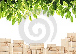 Piles of boxes with green leaf, isolated on white background