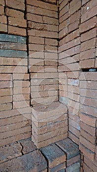 Piles of bricks arranged neatly stratified