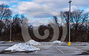 Piles of cleared snow in a parking lot in Edgewood, Pennsylvania, USA