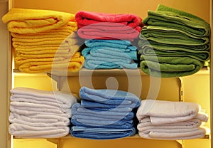 Piles of colorful towels photo
