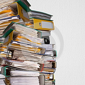 Piles of file binder with documents