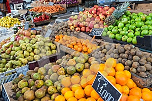 Piles of fruits for sale at a market