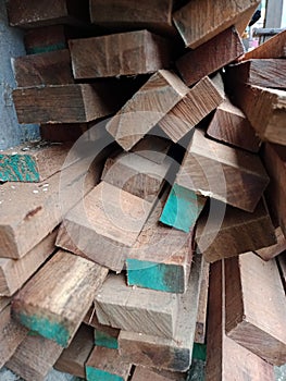 Piles of meranti wood, as a building roof structure material.