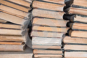 Piles of old books in the library