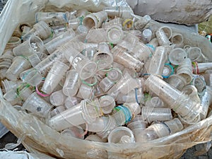 Piles of plastic cup waste