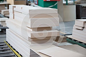 Piles of plywood. Wood processing shop