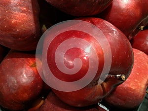 Piles of red apples