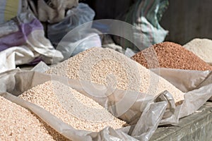 Piles of red and white rice