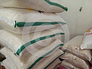 piles of rice in sacks in the branch warehouse