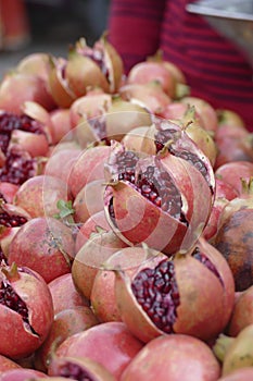 Piles of ripe pomegranates at Ghanta Ghar photo
