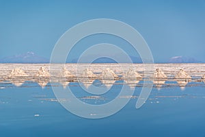 Piles of salt aligned in Salar de Uyuni Uyuni salt flats, Potosi Bolivia