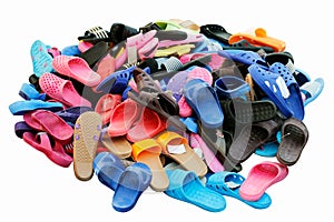 Piles of shoes sold in various color combinations rural land market, sandals, casual shoes isolated white background
