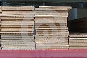 Piles or stacks of paper boxes with goods in storage.