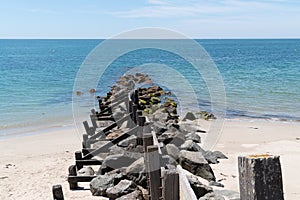 Piles stones anti erosion beach on the island of Noirmoutier VendÃ©e