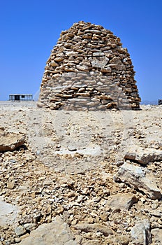 Piles of stones on the beach desert