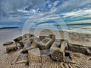 piles of stones do not hinder the beautiful atmosphere of Dabo Singkep Beach photo