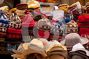Piles of traditional hats on a market stall, Marrakech, morocco photo