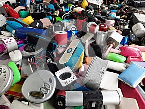 Piles of used electronic and household items are cracked or damaged, Electronic waste is used for reuse and Recycle and is a