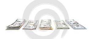 Piles of various dollar notes