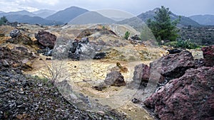 Piles of waste rocks and tailings near abandoned Memi mine in Xyliatos, Cyprus