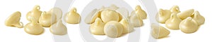 Piles of white chocolate drops set isolated on white background
