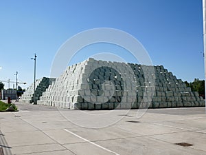 Piles of wrapped solid waste stored on a field next to Pfaffenau waste to energy plant