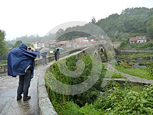 Pilgrim along the way of St. James. Man walking on Camino de Santiago.